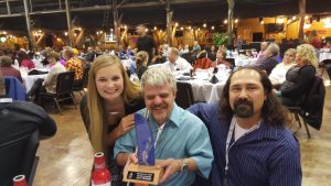 Cross Country Monty receiving Trophy
