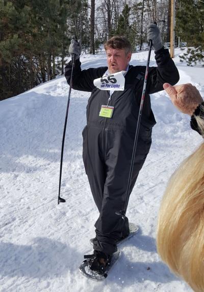 Mark Bugler practices snowshoeing on a previous Black Hills Ski for Light trip.